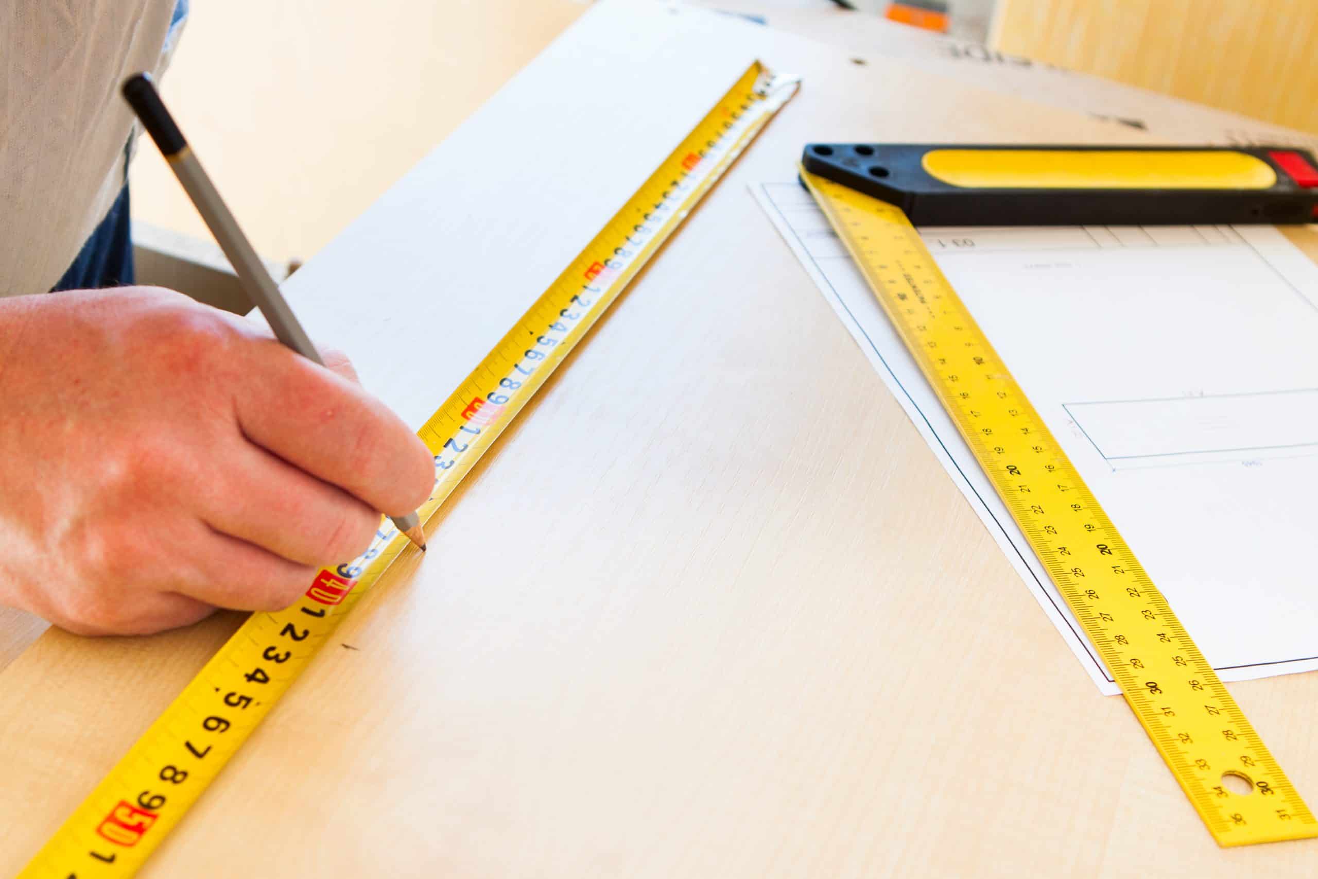 Man draws with a pencil